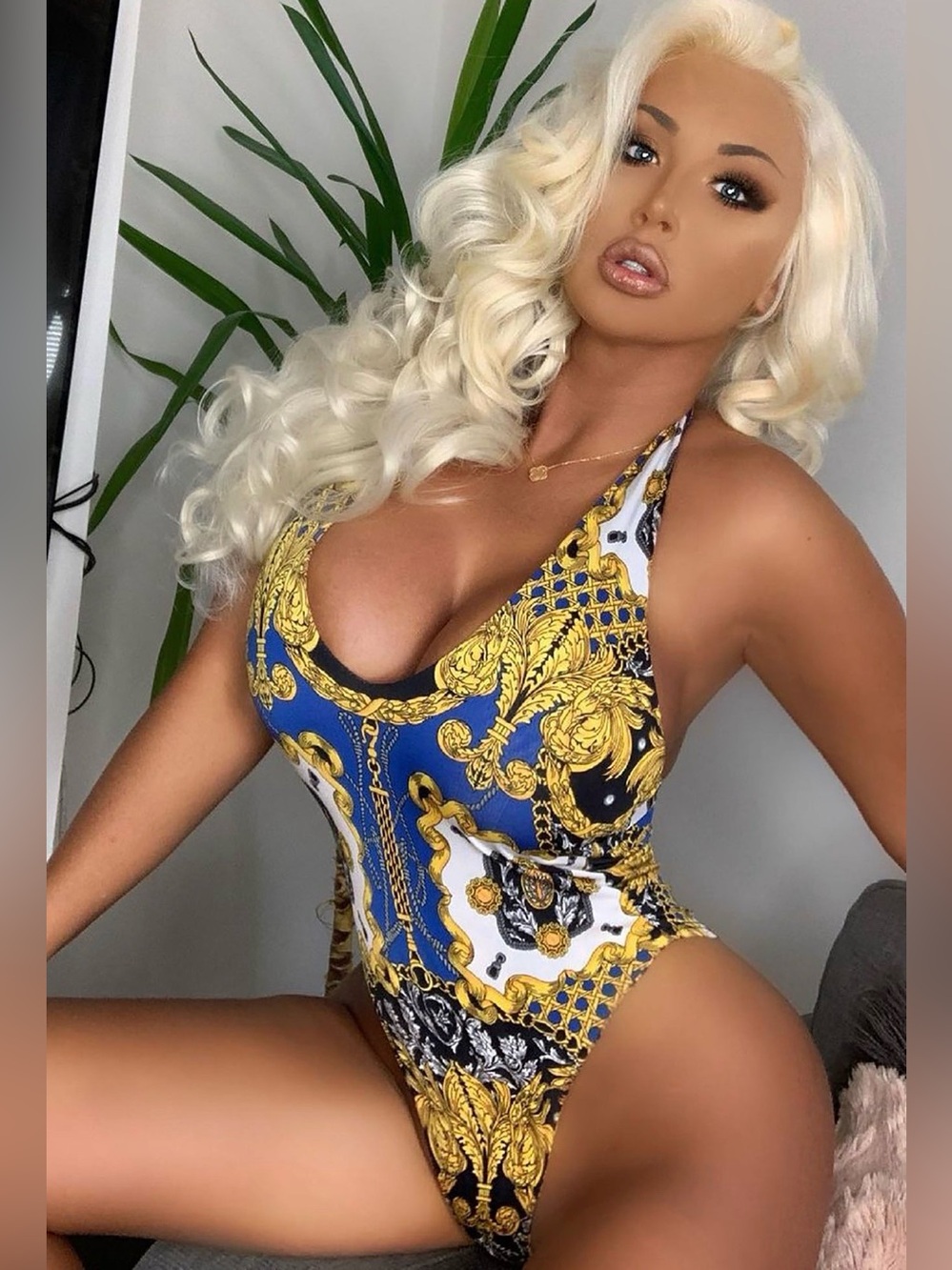 FEELING SASSY BAROQUE BODYSUIT SOZE SMALL STRETCHES TO MEDIUM